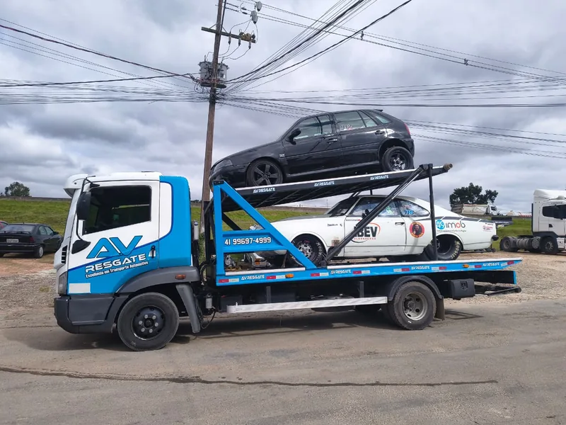 Carro de arrancada e Gol transportados juntos