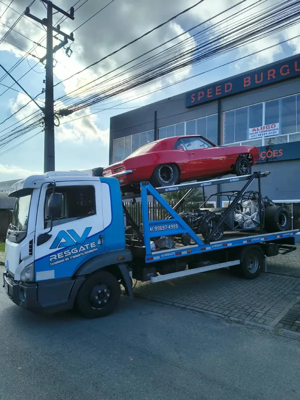 Transporte de Camaro e carro de competição pela AV Resgate